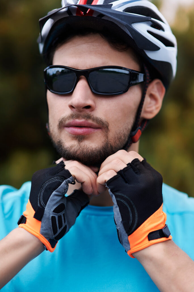 Cyclist wearing his sports helmet