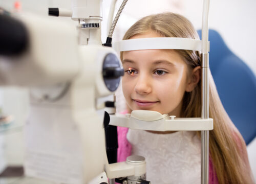A little girl getting an eye exam